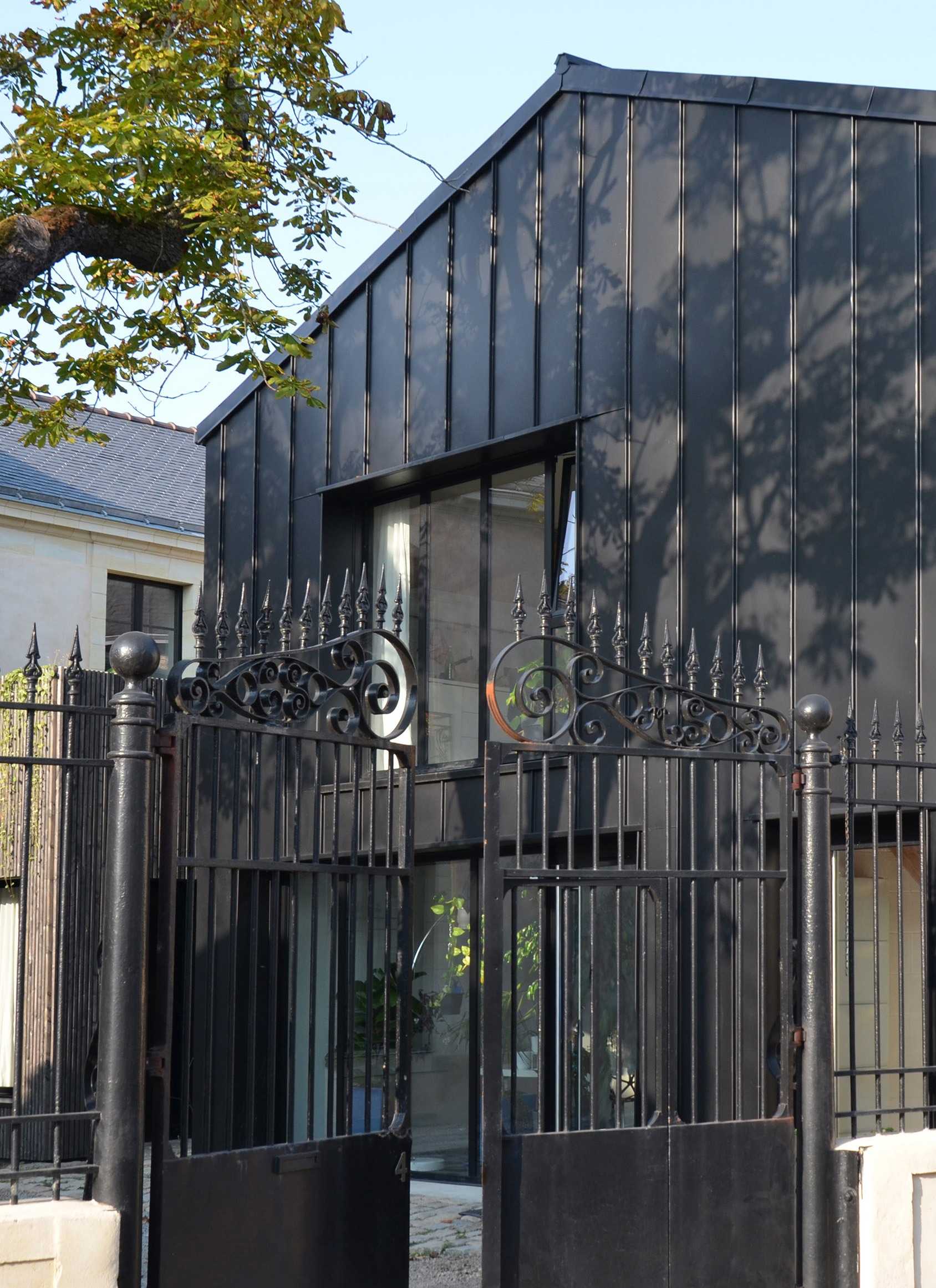 Extension contemporaine d'une maison ancienne par un architecte en Alsace
